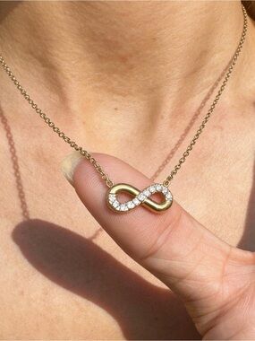 Gold Infinity Pendant Necklace with Clear Stones